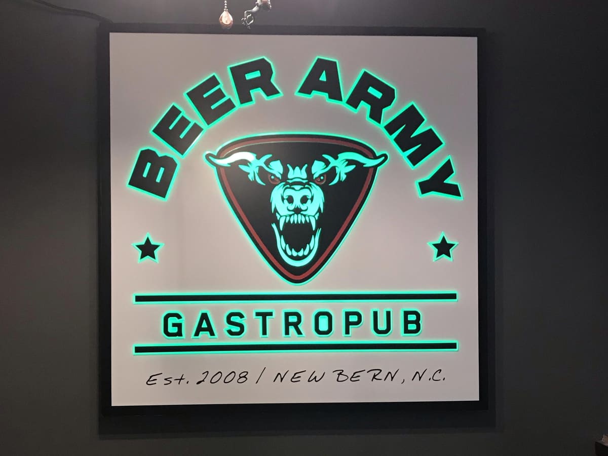 Beer Army Gastropub backlit wall plaque glowing green