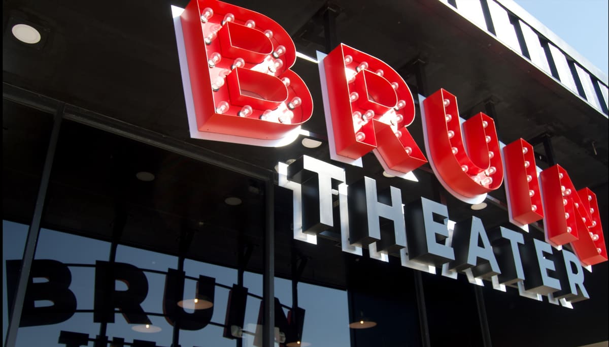 Bruin Theater red marquee-bulb channel letters above the storefront glass