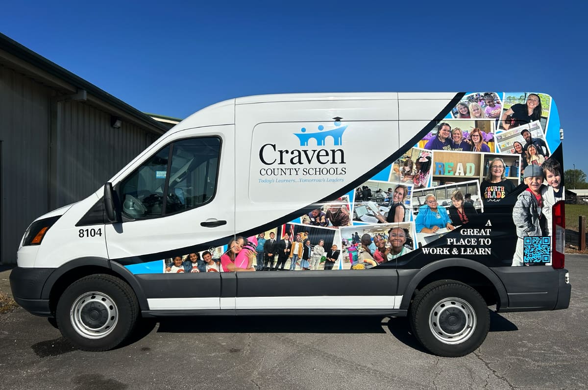 Craven County Schools van with full photo-collage wrap in side profile