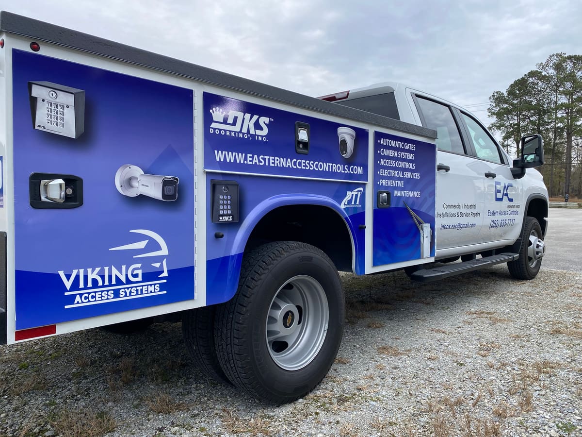 Eastern Access Controls service-body truck with full wrap of cameras and access hardware