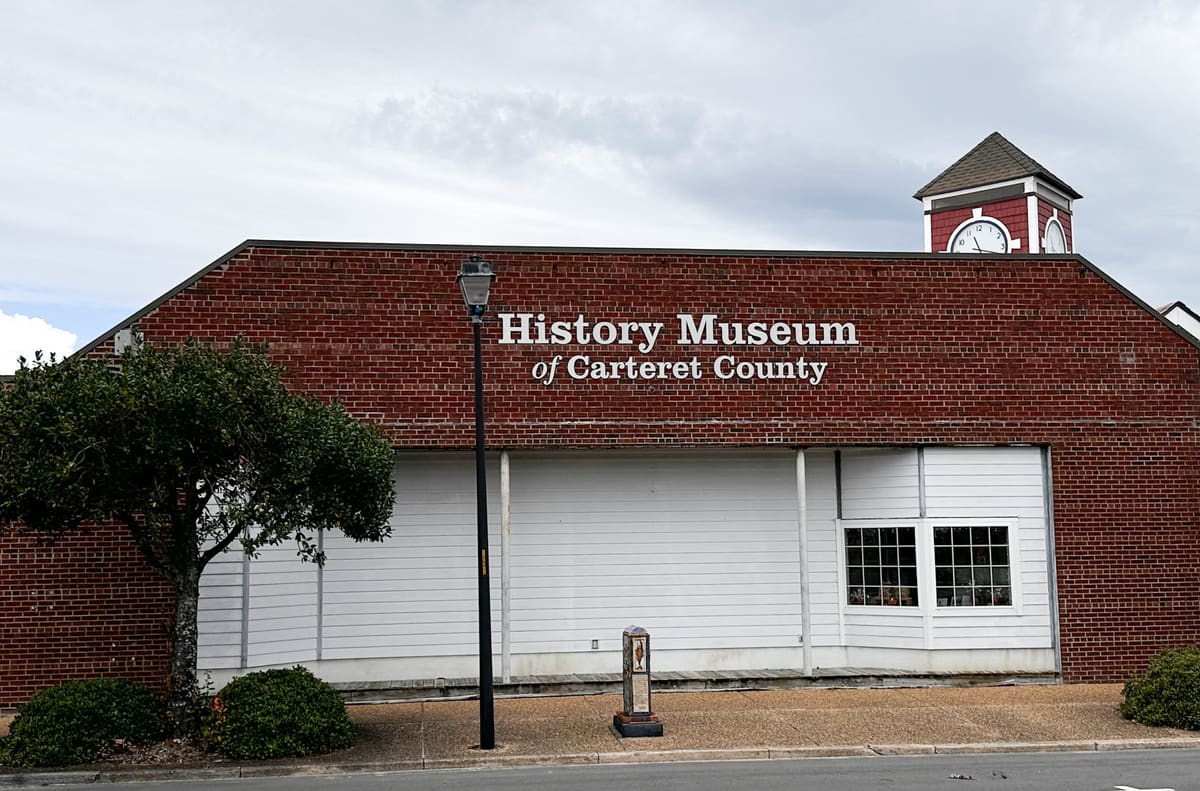History Museum of Carteret County dimensional letters on a brick and clapboard facade